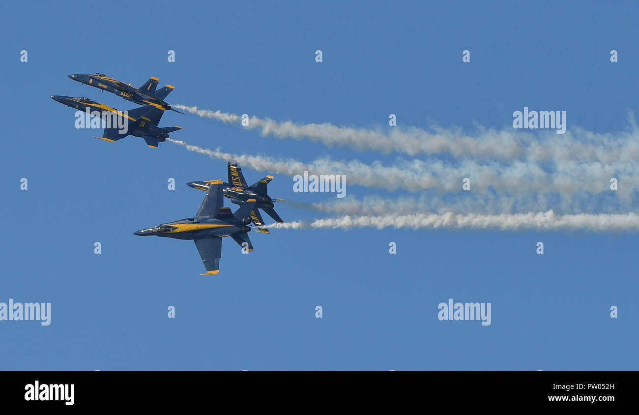 181007-N-ZC358-0355 SAN FRANCISCO (October 7, 2018) The U.S. Navy flight demonstration squadron, the Blue Angels, diamond pilots perform the Barrel Roll Break maneuver during the 2018 San Francisco Fleet Week Air Show. The Blue Angels are scheduled to perform more than 60 demonstrations at more than 30 locations across the U.S. and Canada in 2018. (U.S. Navy photo by Mass Communication Specialist 2nd Class Jess Gray/Released) Stock Photo