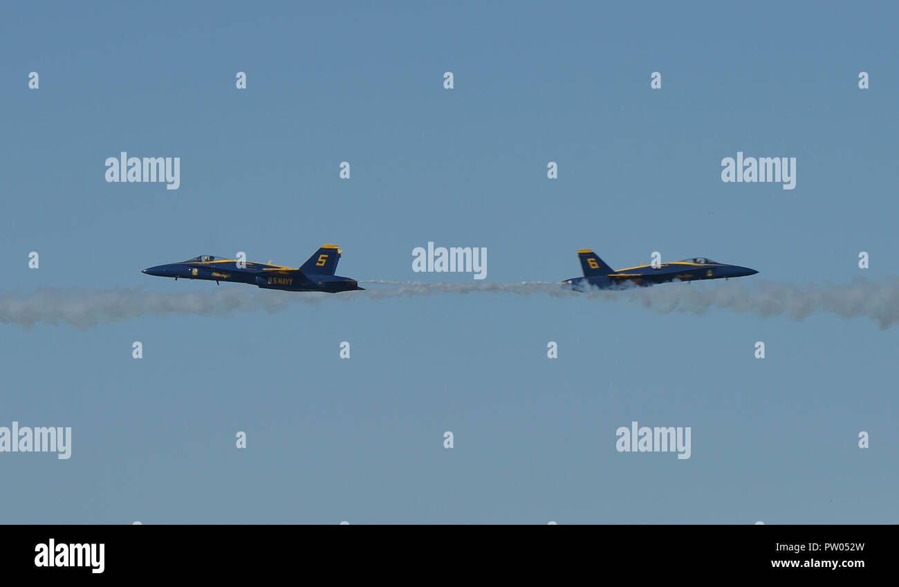 181007-N-ZC358-0323 SAN FRANCISCO (October 7, 2018) The U.S. Navy flight demonstration squadron, the Blue Angels, solo pilots perform the Vertical Pitch maneuver at the 2018 San Francisco Fleet Week Air Show. The Blue Angels are scheduled to perform more than 60 demonstrations at more than 30 locations across the U.S. and Canada in 2018. (U.S. Navy photo by Mass Communication Specialist 2nd Class Jess Gray/Released) Stock Photo
