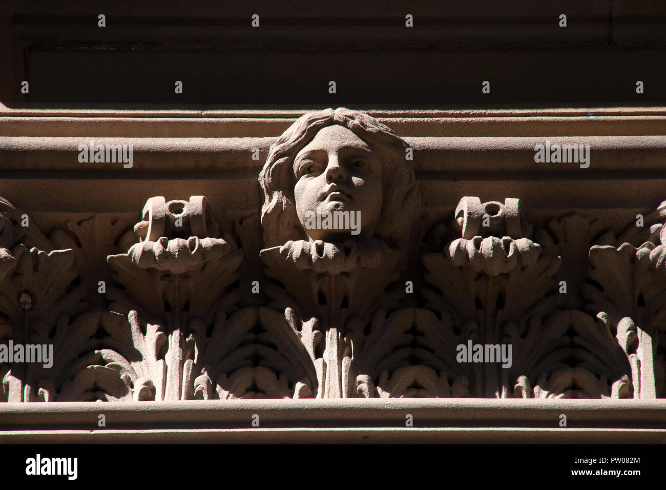 Sydney Australia, Sydney Hospital sandstone decoration of an angel looking over Macquarie street Stock Photo