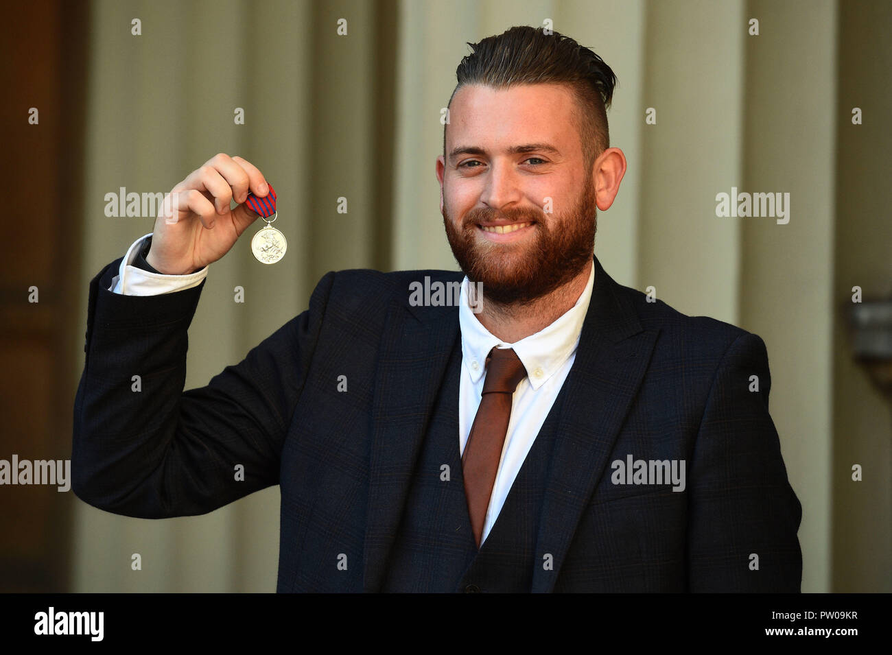 Constable Charles Guenigault after receiving the George Medal for his actions in the London Bridge attack following an Investiture ceremony at Buckingham Palace, London. Stock Photo