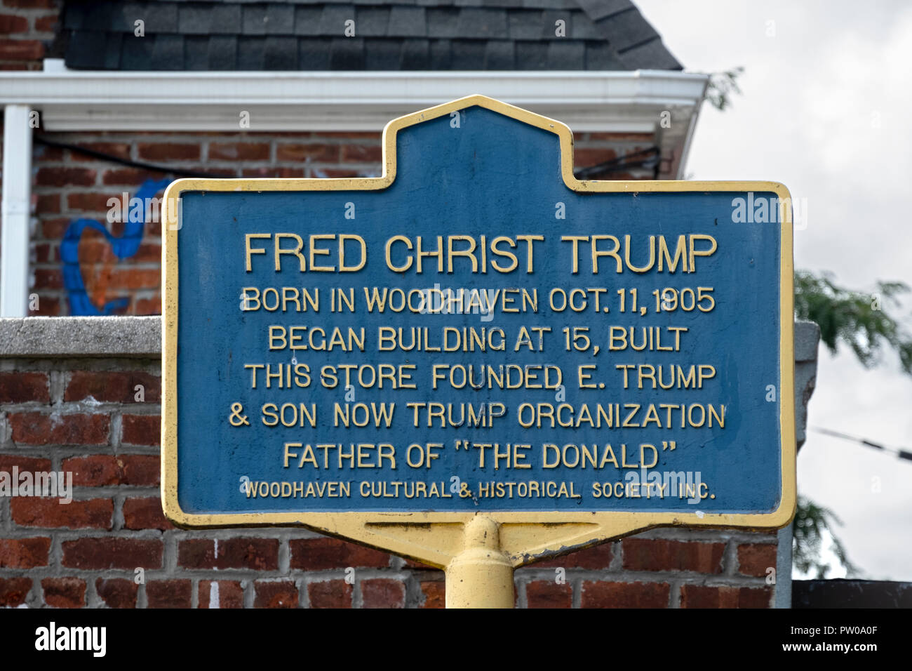 A plaque on Jamaica Ave. in Woodhaven, Queens commemorating Donald Trump's father, Fred Christ Trump, who was born in Woodhaven in 1905. Stock Photo