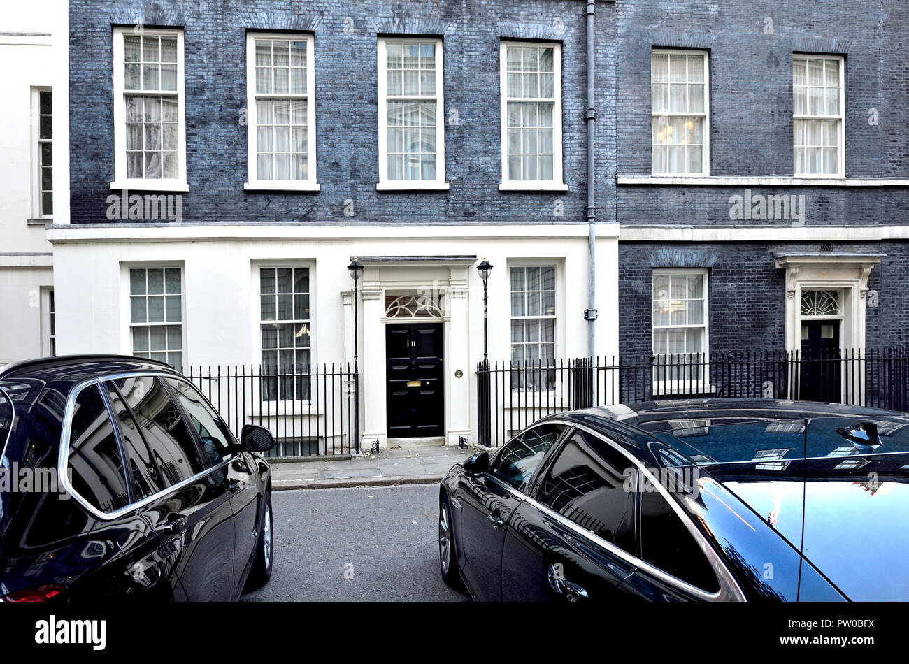 Official cars parked in front of Number 11 Downing Street, London, England, UK. Stock Photo