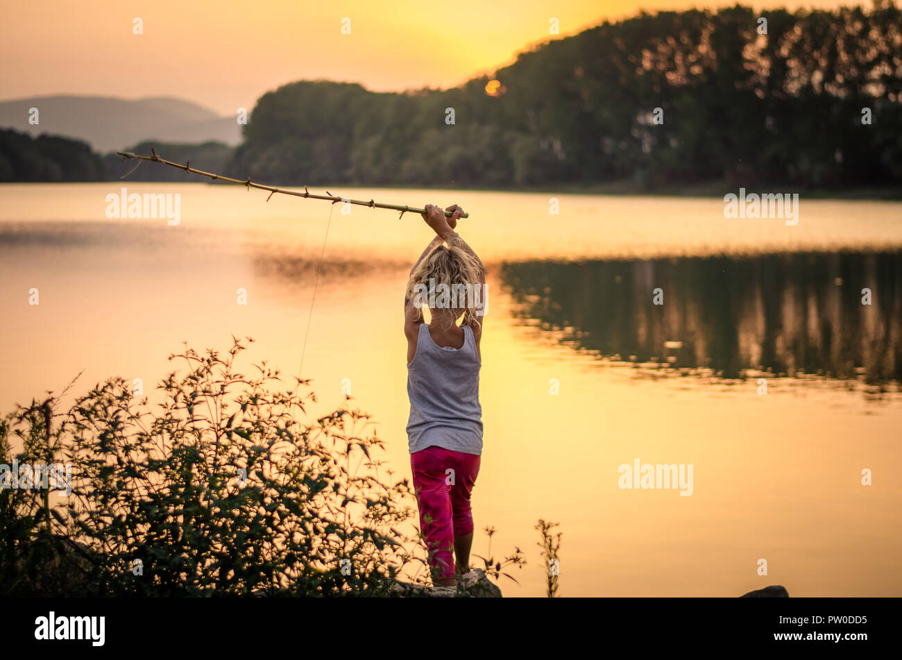 1,615 Kids Fishing Pond Stock Photos, High-Res Pictures, and