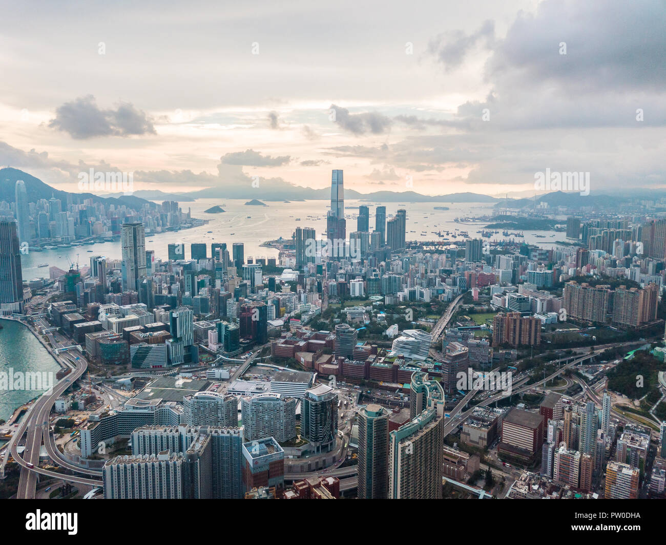 Top view aerial photo from flying drone of a HongKong Global City with development buildings, transportation, energy power infrastructure. Financial a Stock Photo