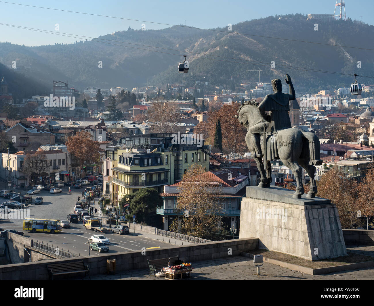 Equestrian statue of King Vakhtang Gorgasali overlooking Tbilisi old town from Metekhi rocky cliff, Georgia Stock Photo