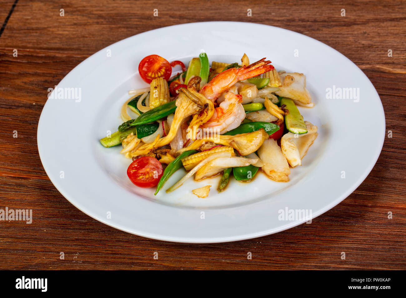 Stir fry with seafood and vegetables Stock Photo - Alamy