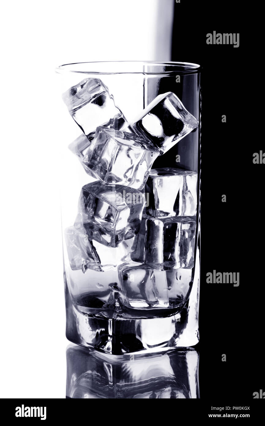 glass with ice water isotated on white an black background Stock Photo ...