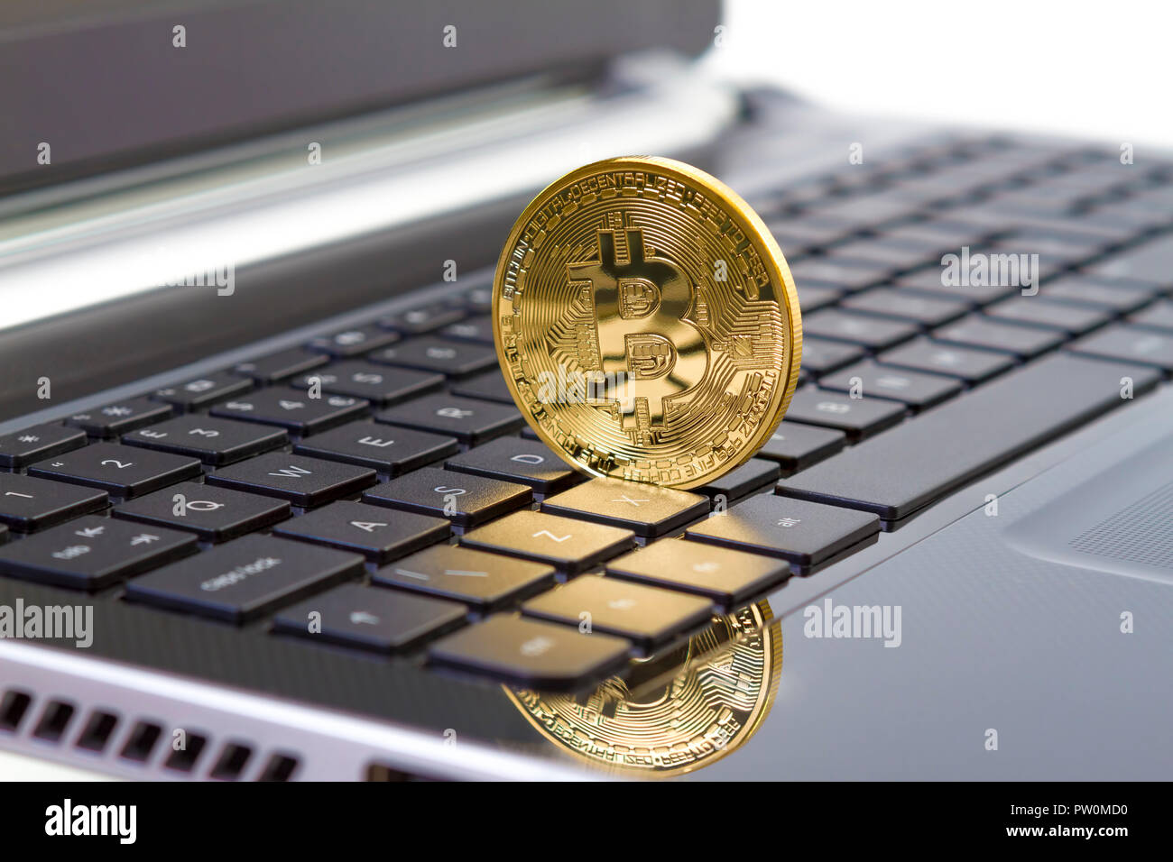 golden bitcoin on keyboard laptop with forex trading graph background Stock  Photo - Alamy