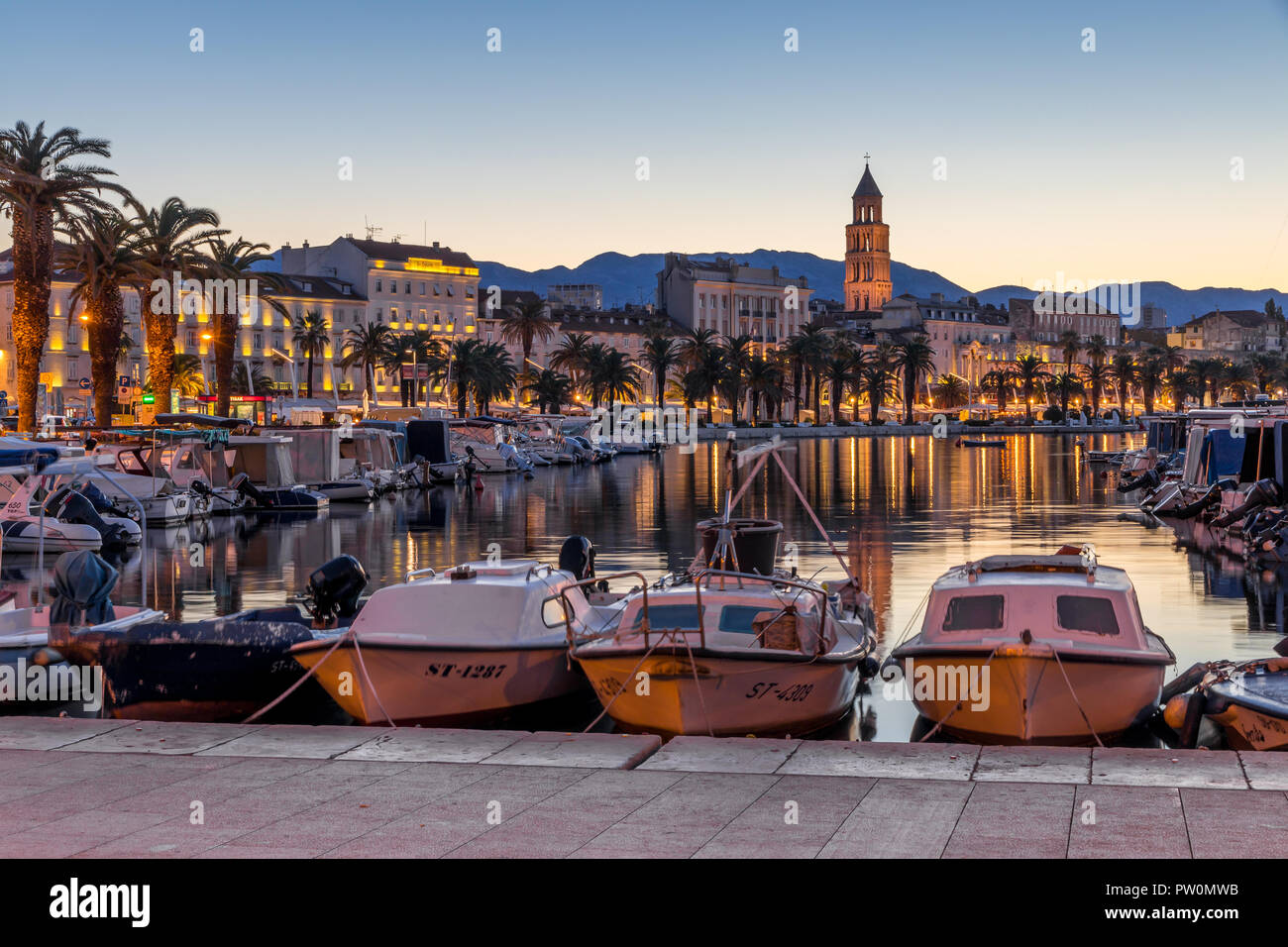 The port, the seaside promenade and the cathedral of Split at dusk, Split, Croatia, Europe Stock Photo