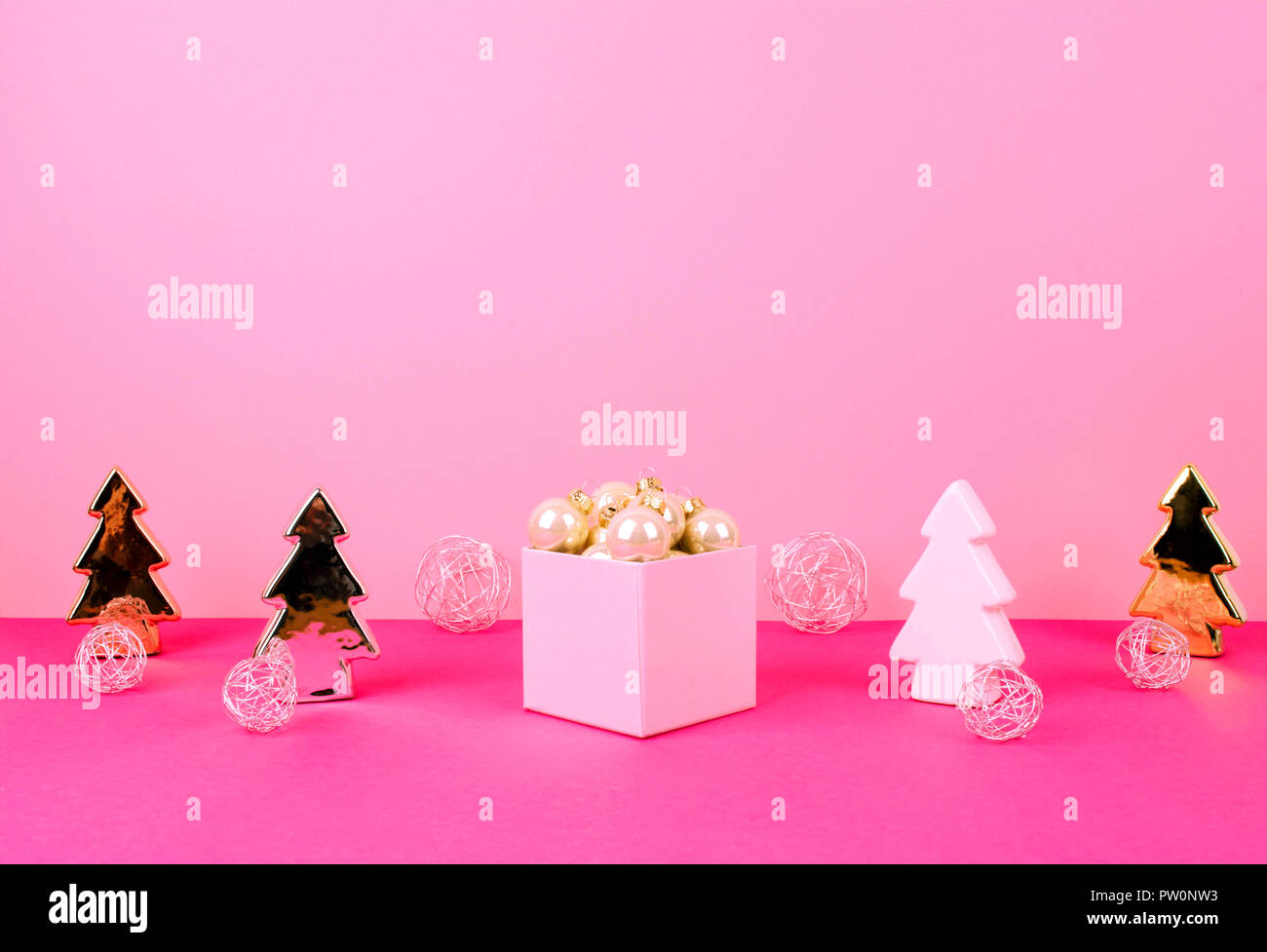 Christmas tree balls on a pink background Stock Photo - Alamy