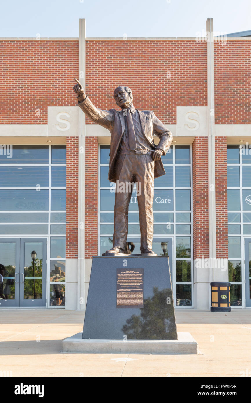 COLUMBIA, MO/USA - JUNE 8 , 2018: Norm Stewart sculpture and Mizzou Arena on the campus of the University of Missouri. Stock Photo
