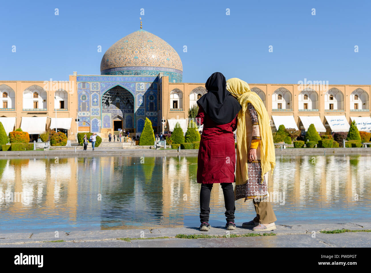Young muslim girls at market square in Esfahan, Iran. Biggest bazar of middle east in Isfahan, Iran. Stock Photo