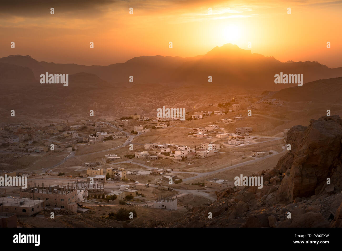 Wadi Musa, city of Petra in Jordan. Beautiful sunset over Wadi Musa, town located in Ma'an Governorate in southern Jordan. It is the administrative ce Stock Photo