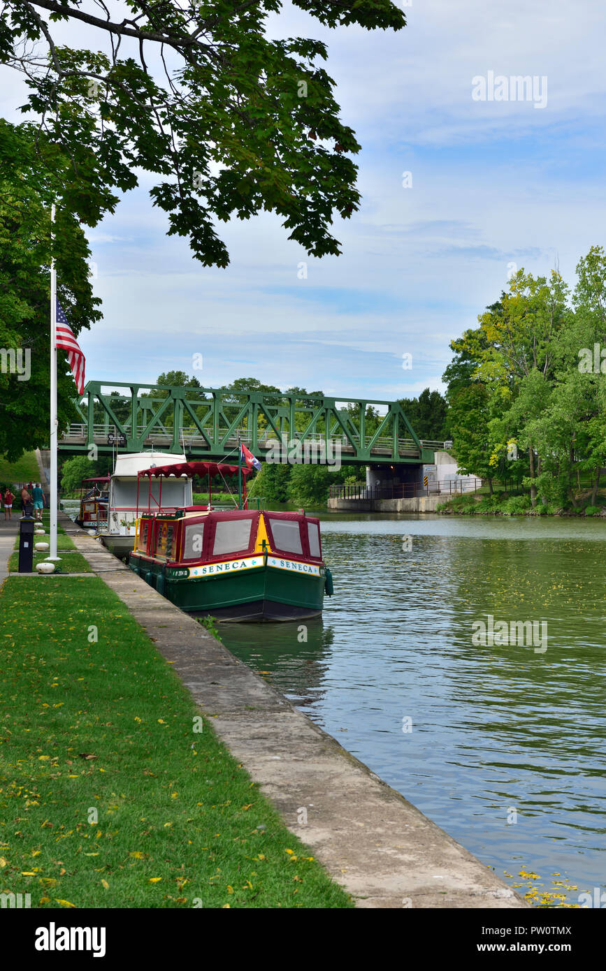 Canal barge moored on Erie canal in village of  Pittsford, New York, USA Stock Photo