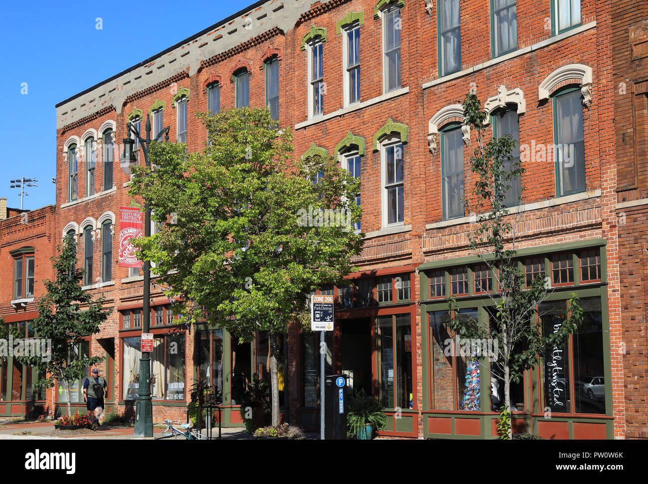 Bars, restaurants and shops on hip Michigan Avenue, in Cortown, Detroit, in the USA Stock Photo