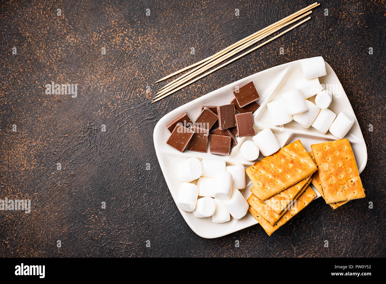 Ingredients for toasting marshmallows and cooking s'mores Stock Photo