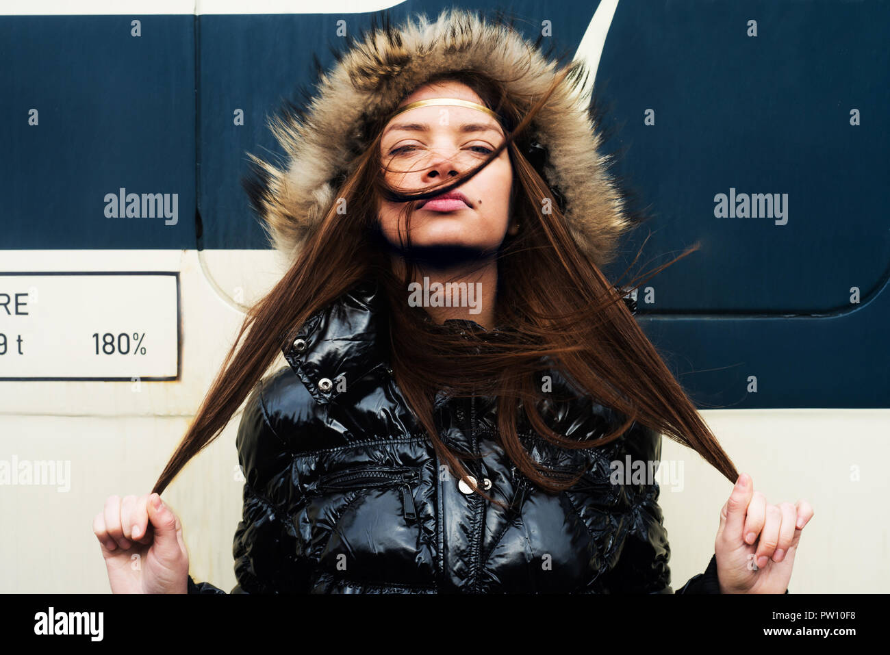 Young woman pulled her hair Stock Photo - Alamy