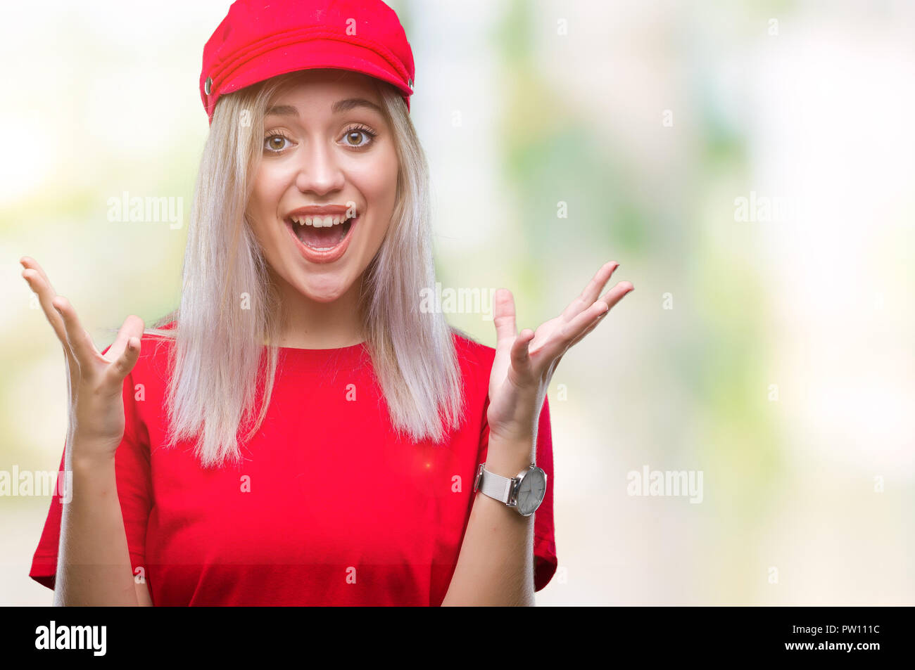 Young blonde woman wearing red hat over isolated background celebrating crazy and amazed for