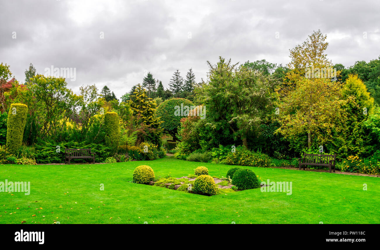 A mown green lawn in the gardens area of Crathes Castle, Aberdeenshire, Scotland Stock Photo