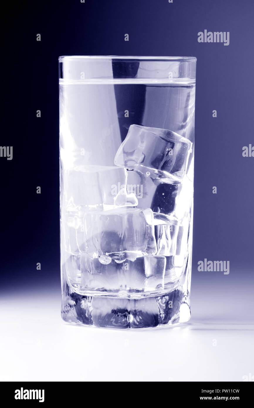 glass with ice water isotated on white an black background Stock Photo ...