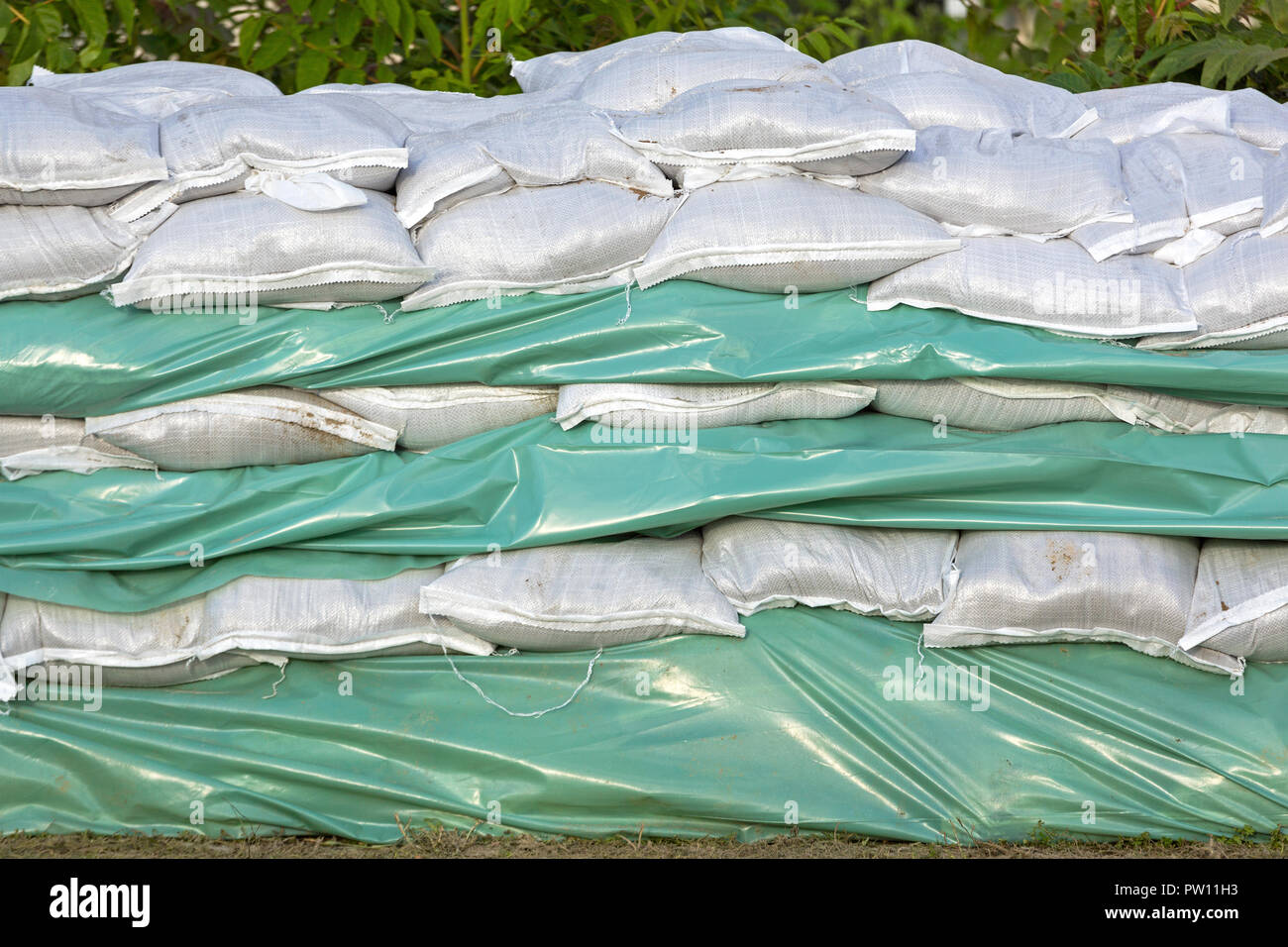 Wall of sandbags and tarp for flood protection Stock Photo Alamy