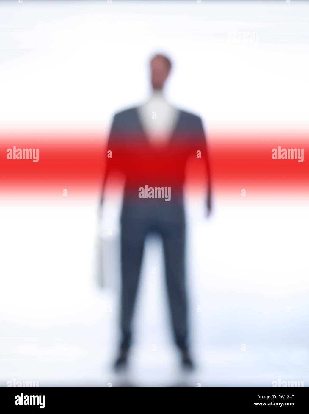Concept A Business Man with Briefcase, standing behind a blurred Red Tape, Bureaucracy, Red Tape Stock Photo