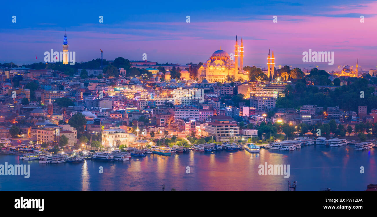 Sunset in Istanbul Turkey seen from Galata Tower over the river bosphorus and golden horn, soft sun light cityscape skyscrapers and skyline istanbul Stock Photo