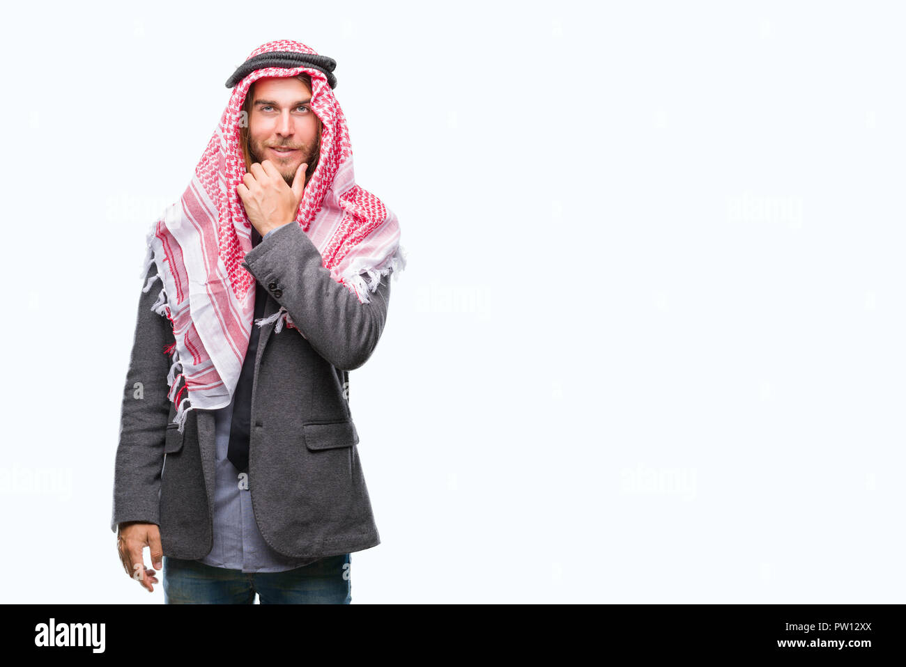Young handsome arabian man with long hair wearing keffiyeh over isolated  background looking confident at the camera with smile with crossed arms and  h Stock Photo - Alamy