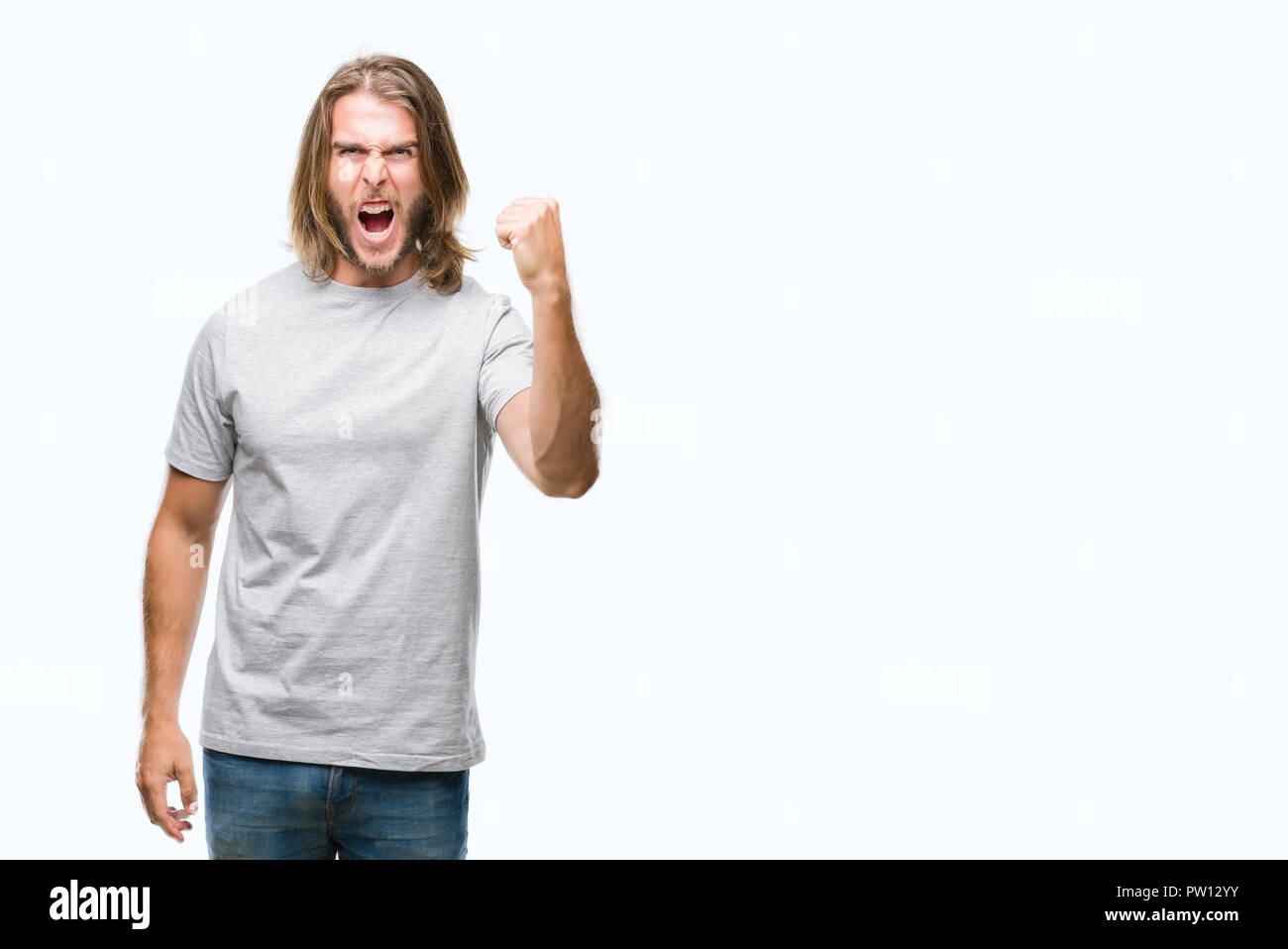 Guy Raging Stock Young handsome man with long hair over isolated background angry and ...