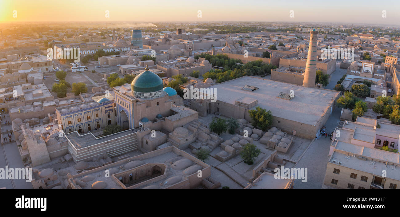 Khiva and Bukhara city sunset in Uzbekistan. Warm light over Khiva city with its beautiful Silk Road architecture Stock Photo