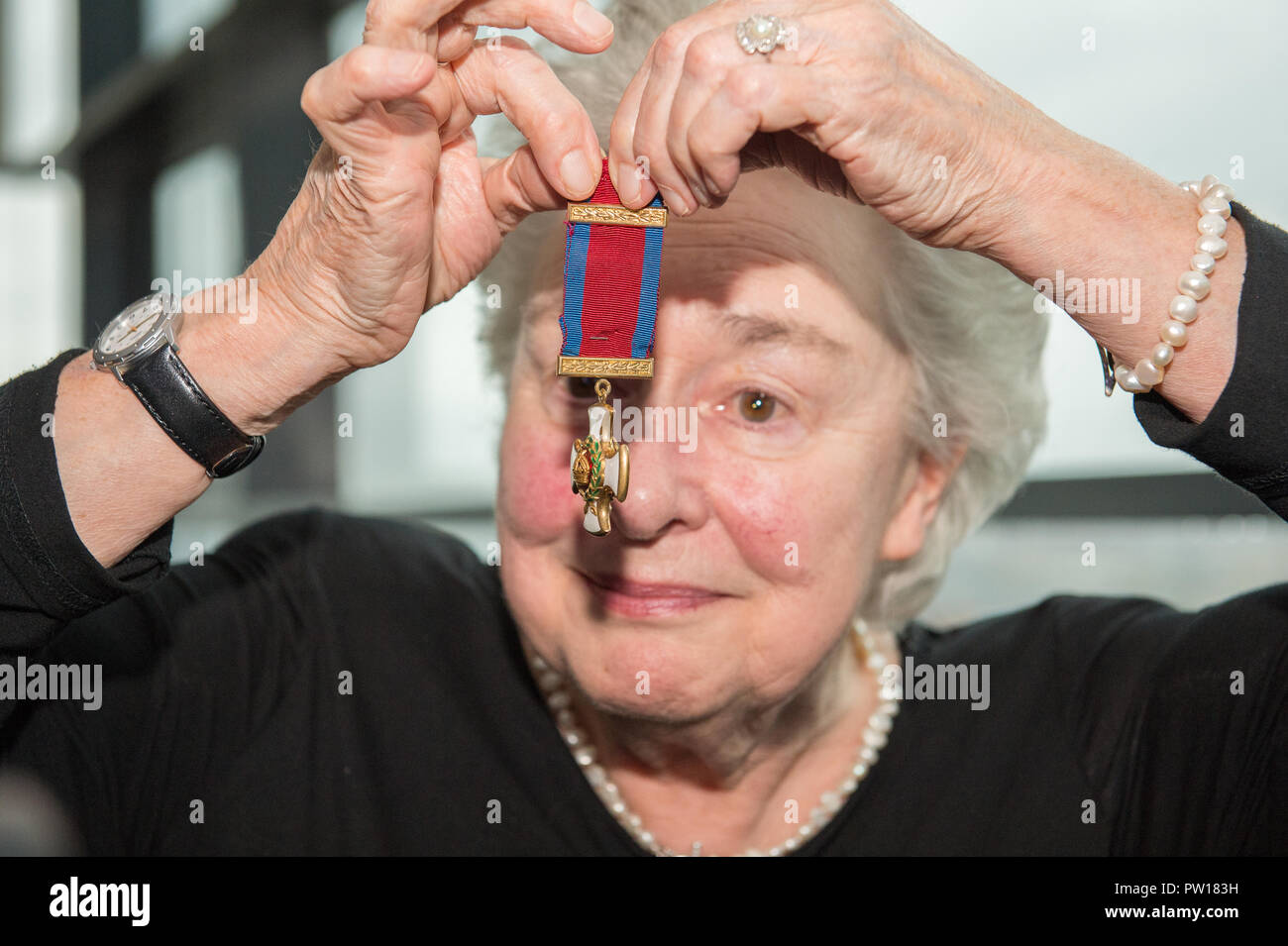 Glasgow, UK. 11th October 2018, Glasgow UK. Second World War Medals being presented to veteran's niece after going missing for decades. The Medals of Colonel William I French of the Glasgow highlanders were found in a safe of a Glasgow accountants four years ago, French Duncan. Helen Woods (James Alexander French's grandaughter) presented with the medals. Credit: Colin Fisher/Alamy Live News Stock Photo
