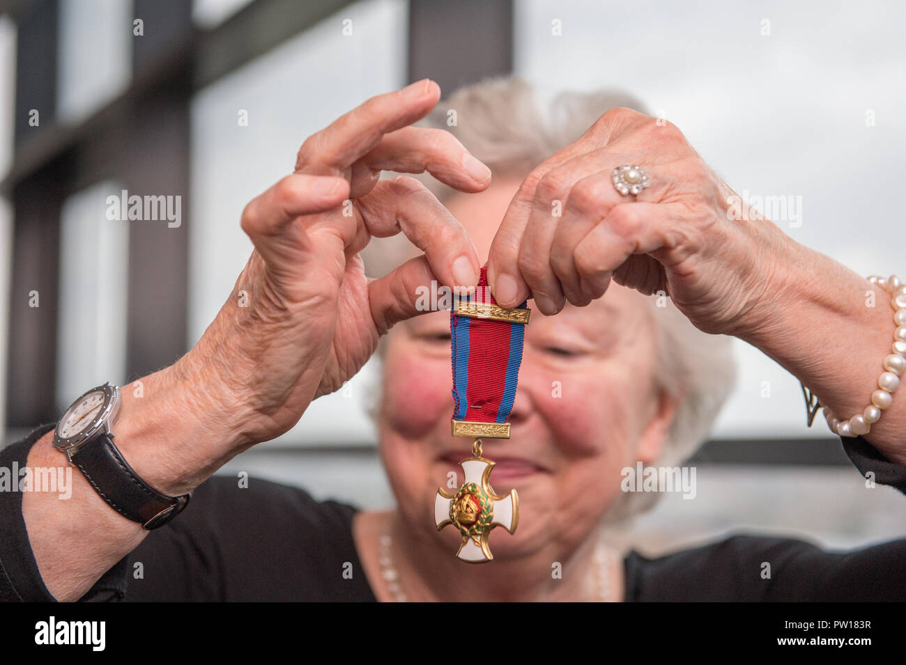Glasgow, UK. 11th October 2018, Glasgow UK. Second World War Medals being presented to veteran's niece after going missing for decades. The Medals of Colonel William I French of the Glasgow highlanders were found in a safe of a Glasgow accountants four years ago, French Duncan. Helen Woods (James Alexander French's grandaughter) presented with the medals. Credit: Colin Fisher/Alamy Live News Stock Photo