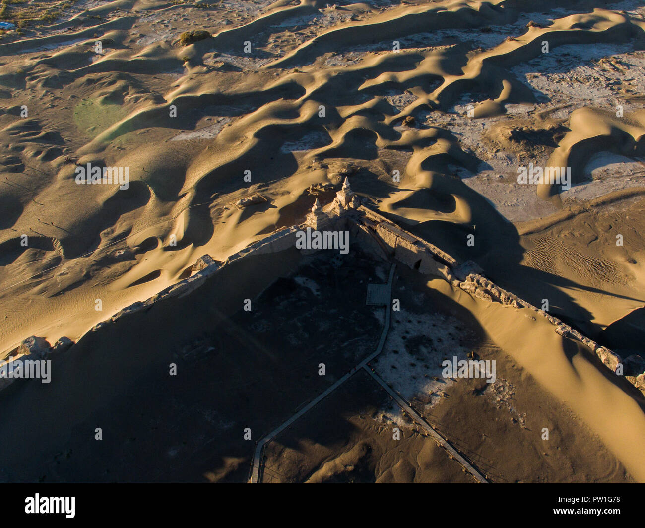 Ejina Banner. 11th Oct, 2018. Aerial photo taken on Oct. 11, 2018 shows relics of Heicheng, an ancient city built during China's Western Xia Dynasty (1038-1227), in Ejina Banner of Alashan, north China's Inner Mongolia Autonomous Region. Credit: Liu Lei/Xinhua/Alamy Live News Stock Photo