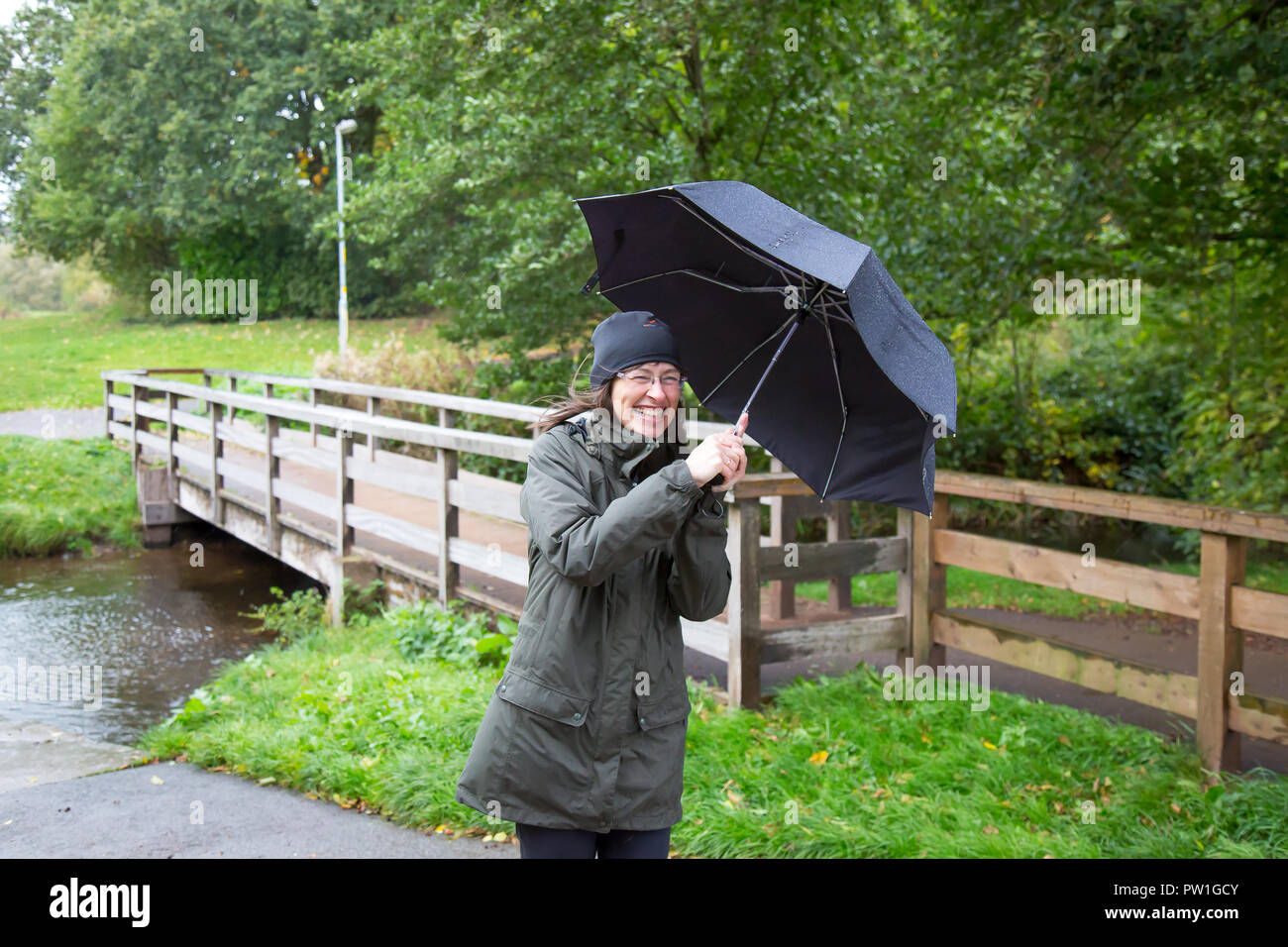 Struggling with wind hi-res stock photography and images - Alamy