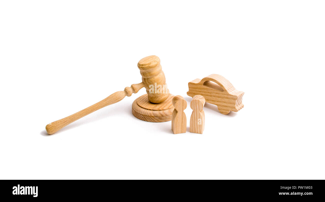 Wooden figurine of a car with people in a hammer of the judge on a white background. Minimalism. Purchase and sale of the car. The trial, confiscation Stock Photo