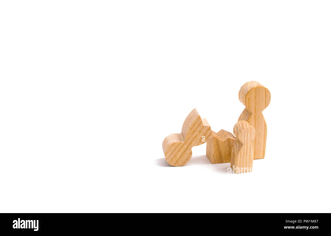 Family figures, one of the parents is broken. Survivor's loss concept. The death of a parent. Divorce, single mother, single father. Defective family, Stock Photo