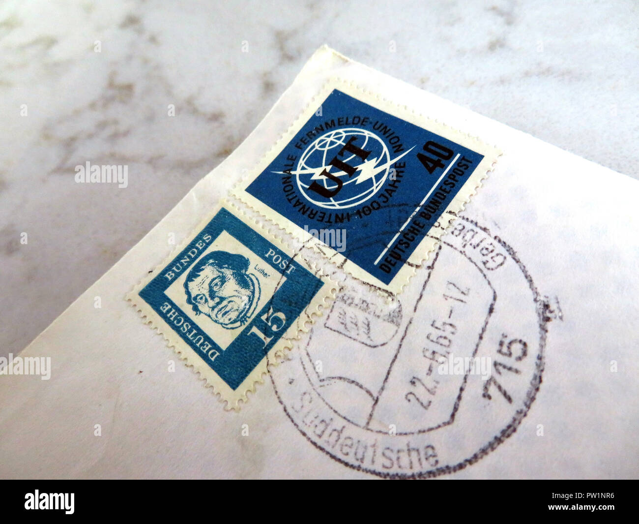 Closeup of German postage stamps on a Letter from abroad Stock Photo