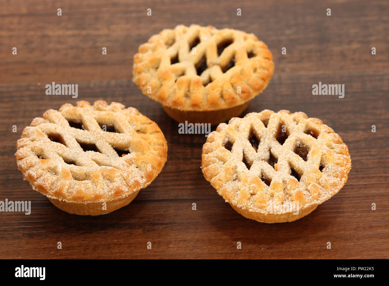 Christmas mince pies on a wooden background Stock Photo - Alamy