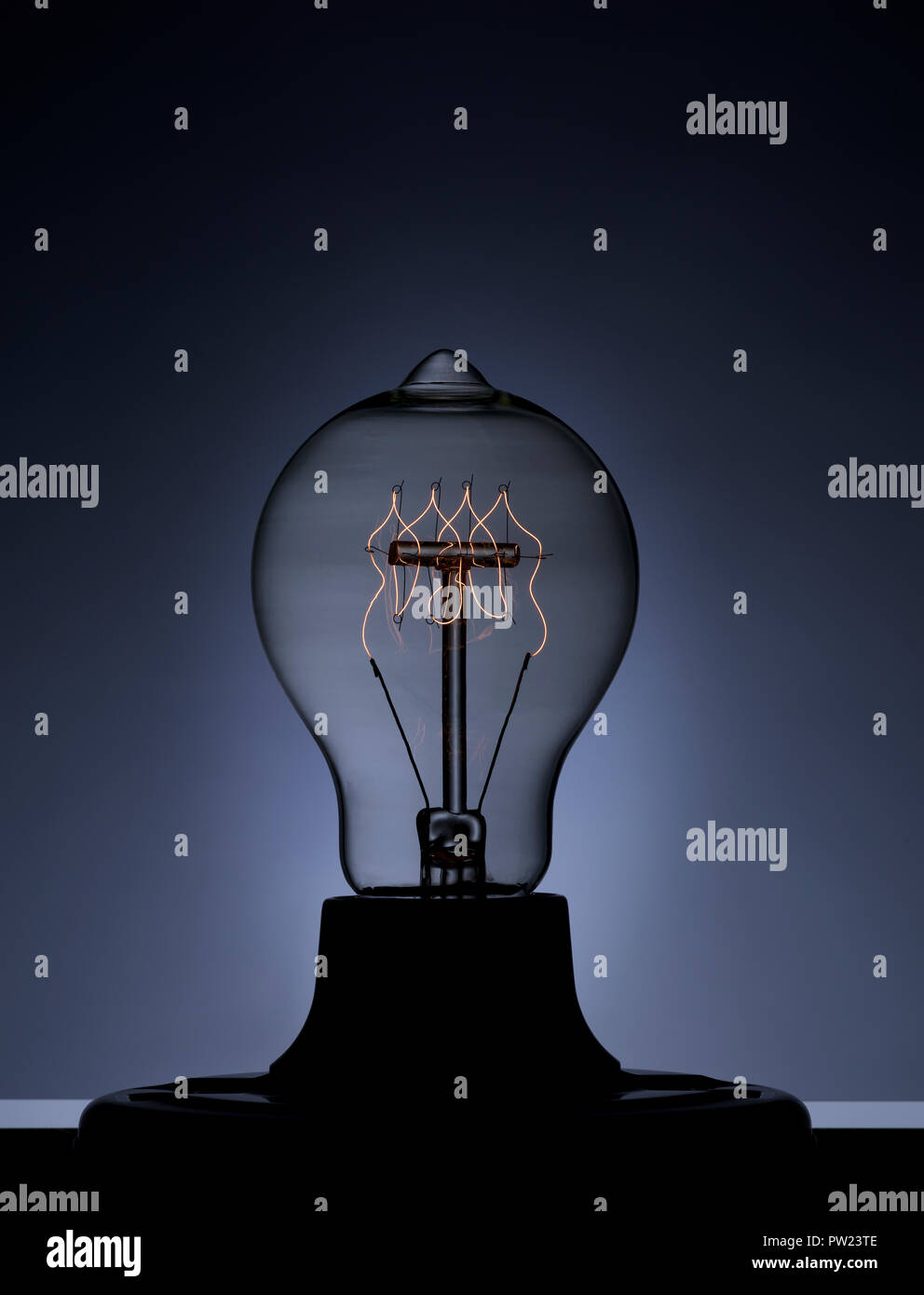 Vintage Glass Light Bulb with a Dim Light, Tungsten, Wire, Coil, Night