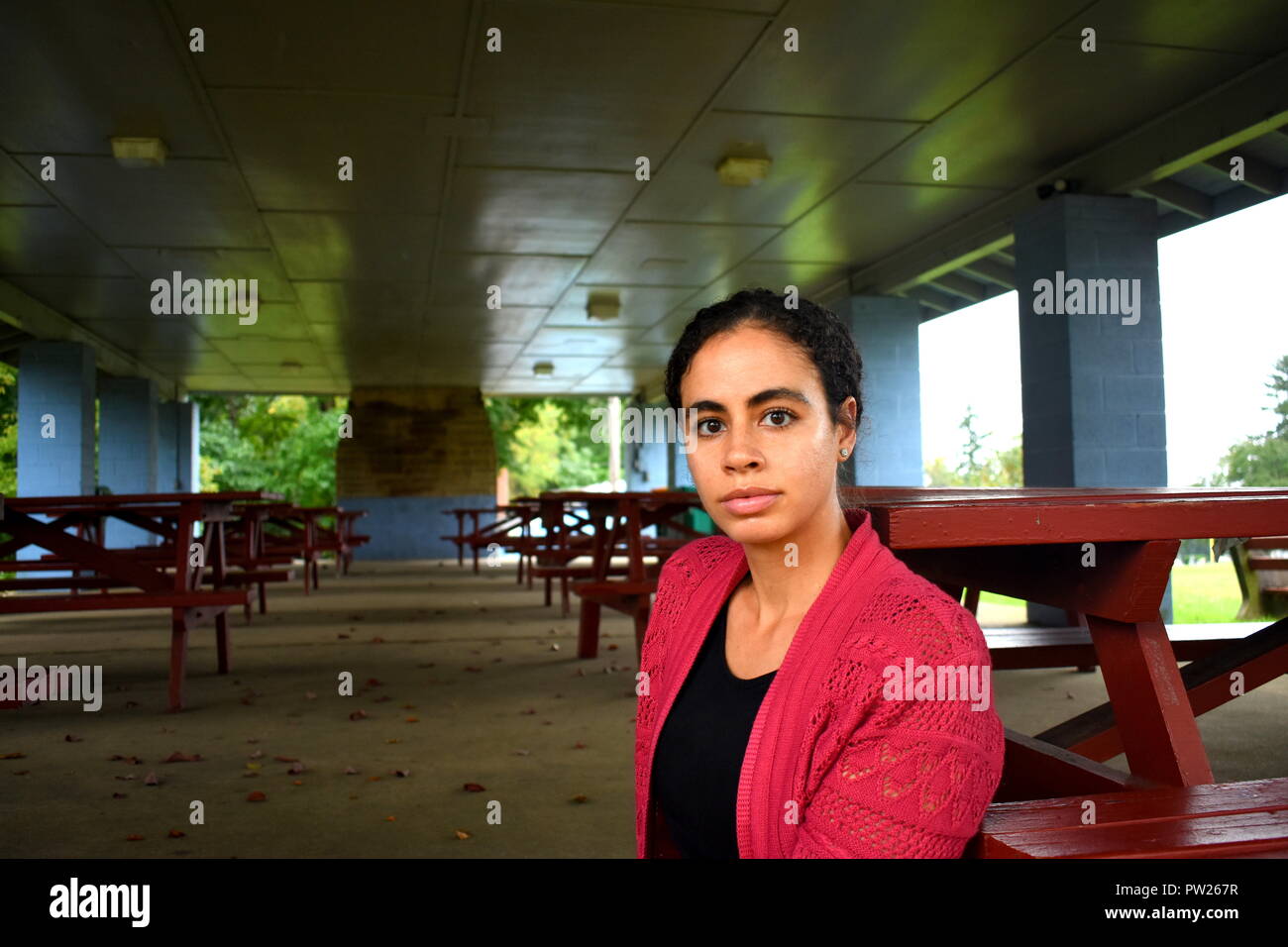 Girl By Park Benches. Stock Photo