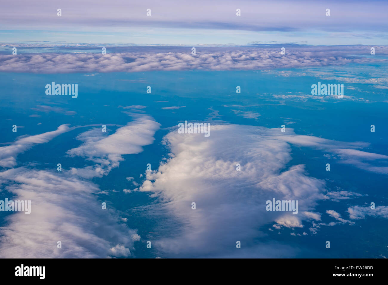 The Cirrostratus cloud formation view from aircraft window Stock Photo
