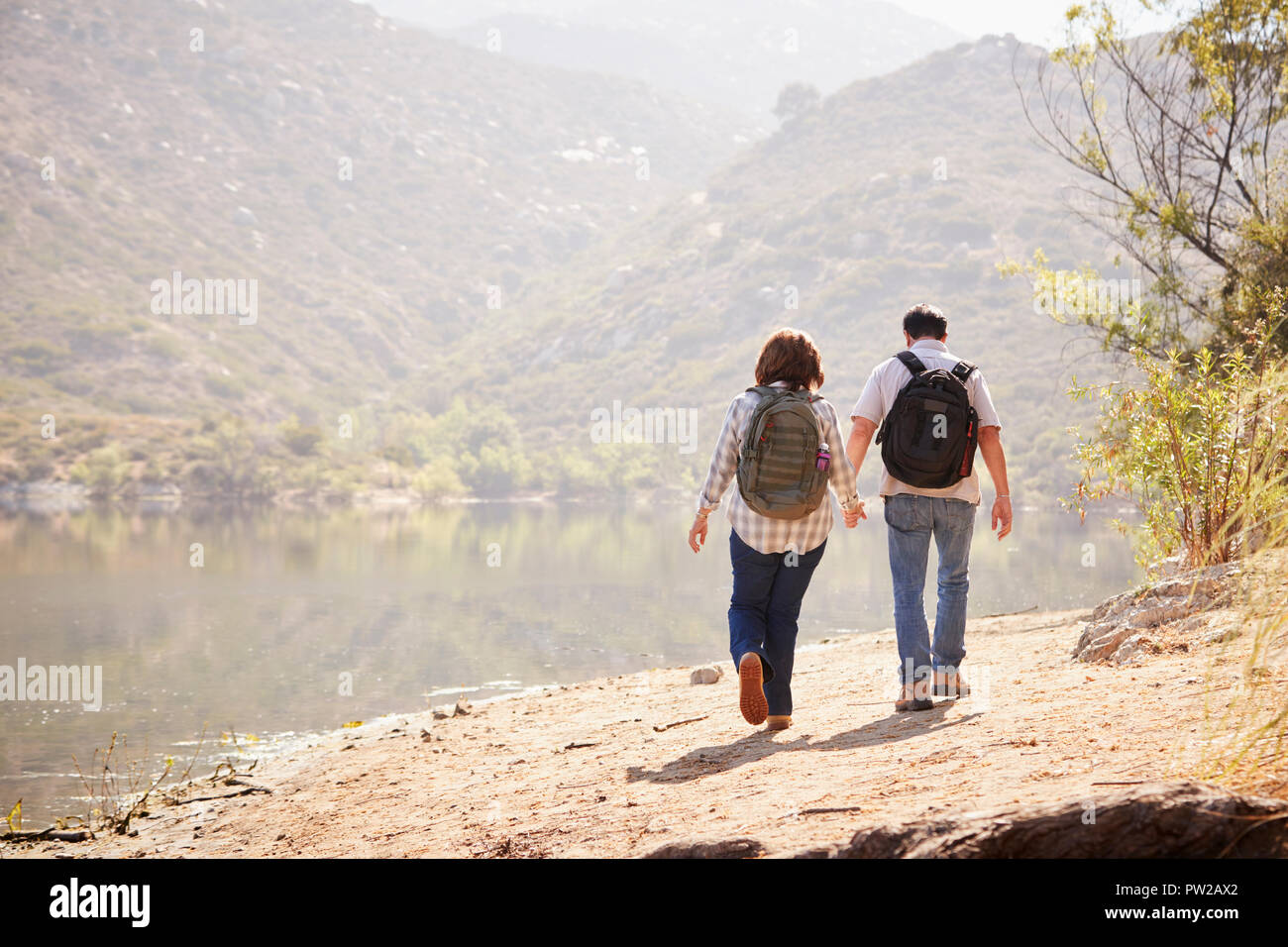 Back view couple in 60s hi-res stock photography and images - Alamy