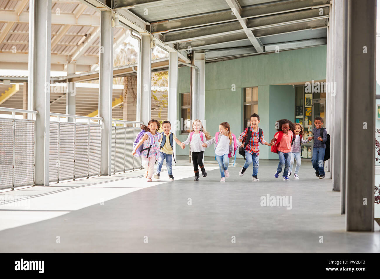 School boys holding hands hi-res stock photography and images - Alamy