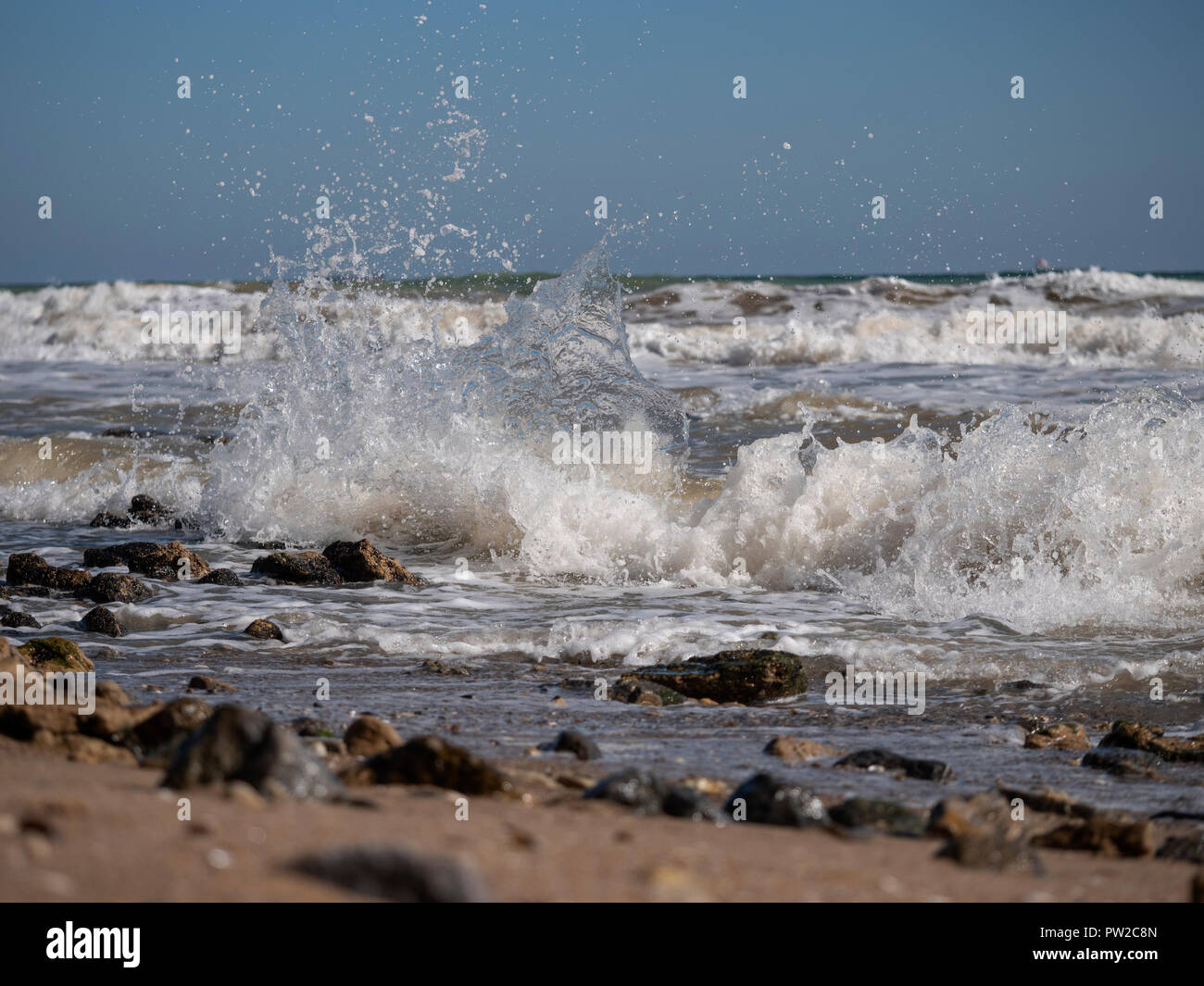 Sea waves roll on sandy hi-res stock photography and images - Alamy
