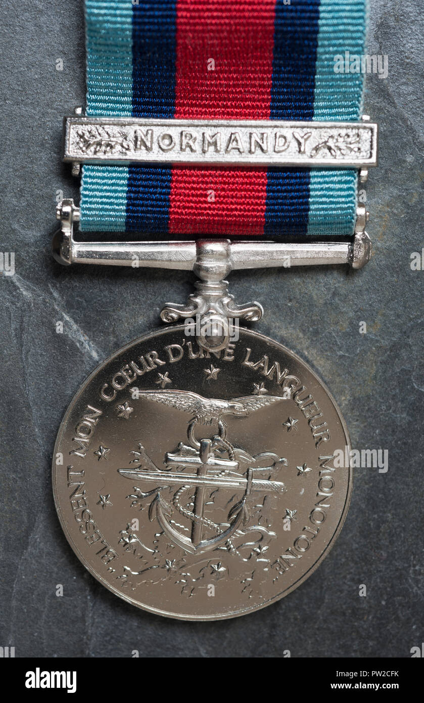 WW2 British Medal, the Normandy Campaign Medal on a slate background. Stock Photo