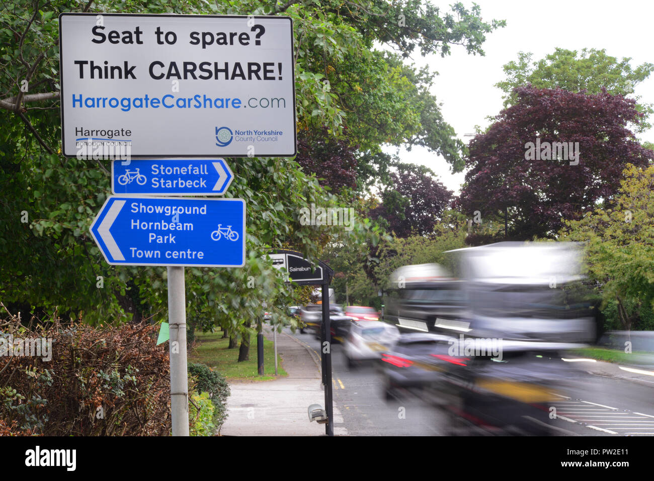 traffic jam by signs of car share scheme designed to reduce road