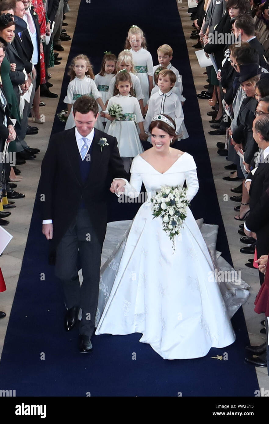 Princess Eugenie and Jack Brooksbank walk down the aisle following(00)