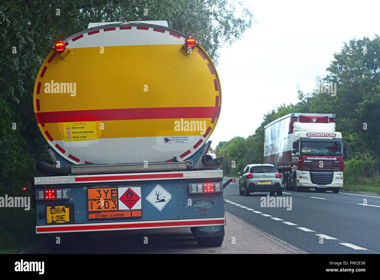 load identification plate on heavy goods vehicle in lay by denoting transportation of flammable liquid uk Stock Photo