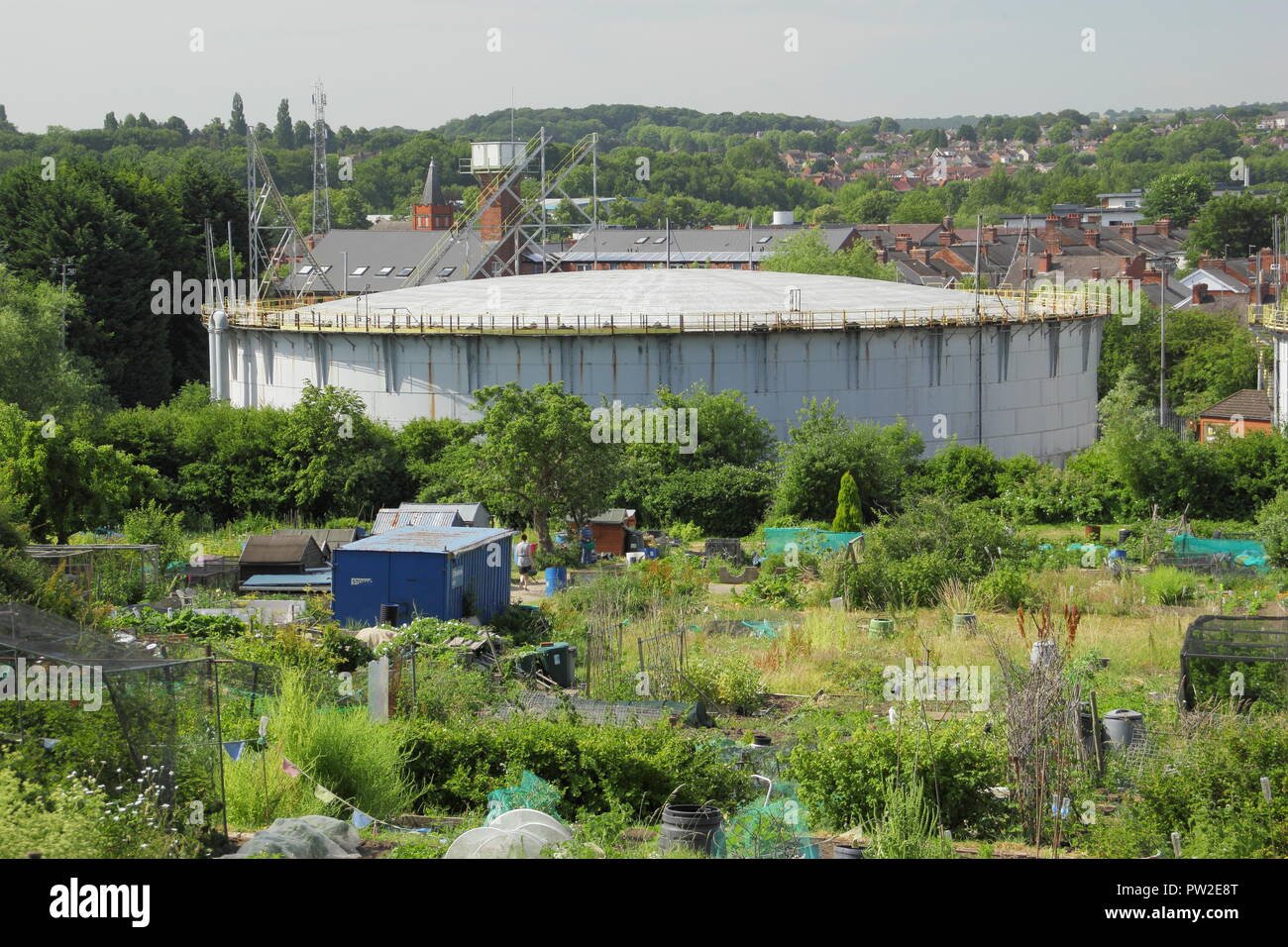 Decommissioned gasometers, or gas holders next to urban allottments, near Chatsworth Road, Chesterfield, Derbyshire, England uk Stock Photo