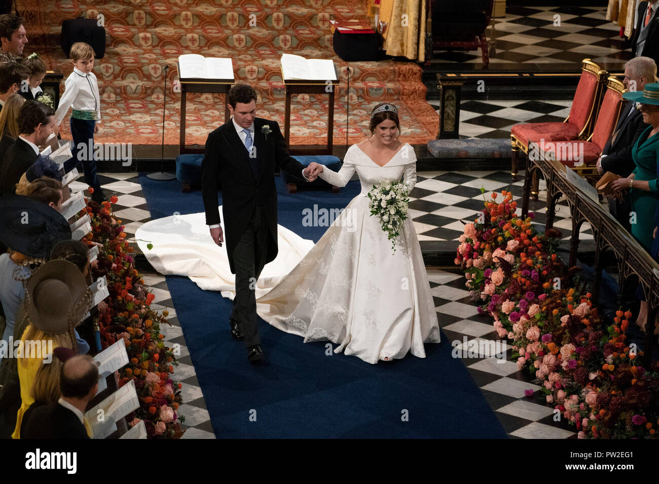 Princess Eugenie and Jack Brooksbank walk down the aisle at St